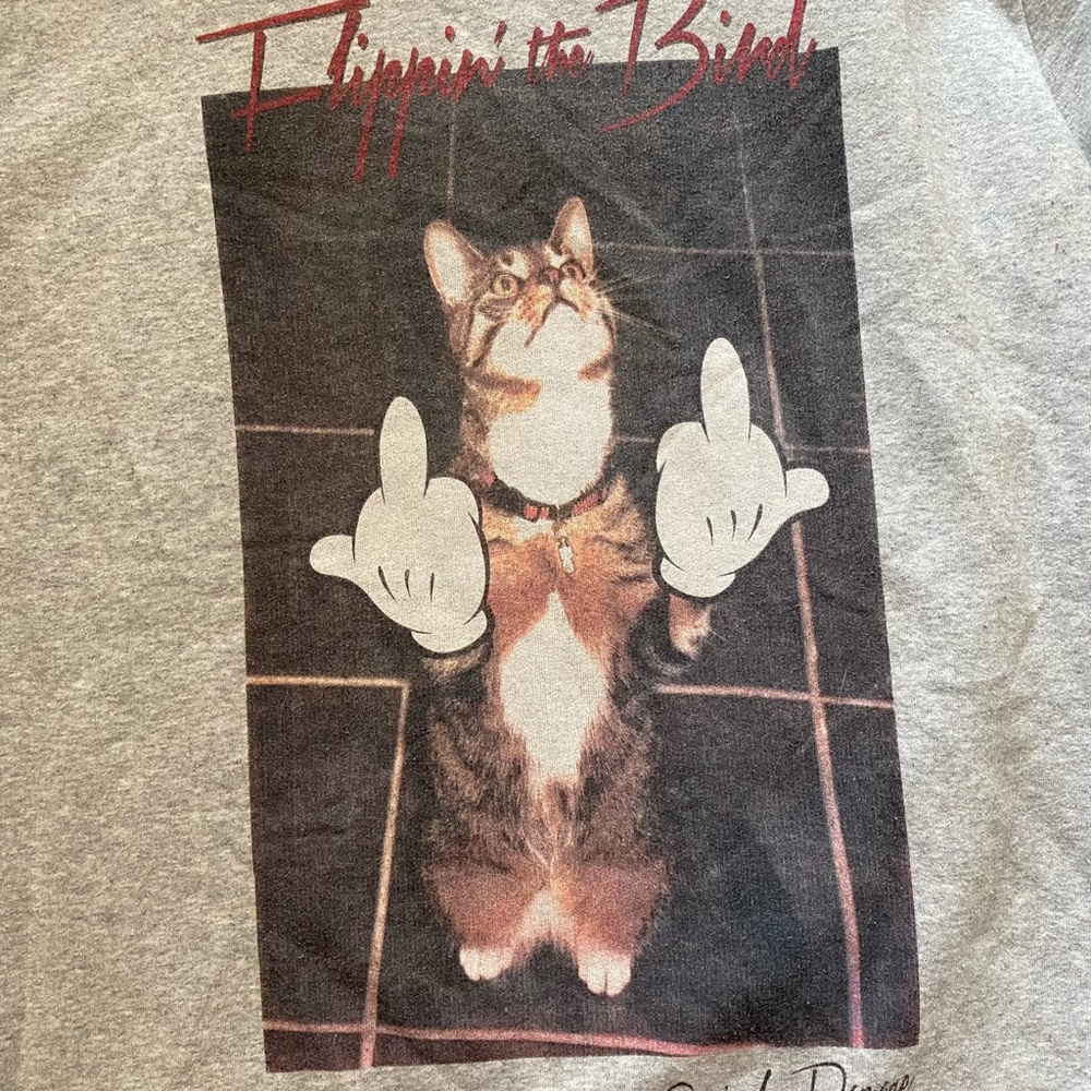 Grey criminal damage pullover